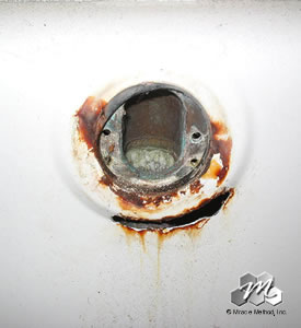 Before Miracle Method repaired the overflow.