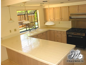 After the Miracle Method makeover of the countertop and backsplash
