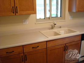 Before the Miracle Method makeover of the countertop and backsplash